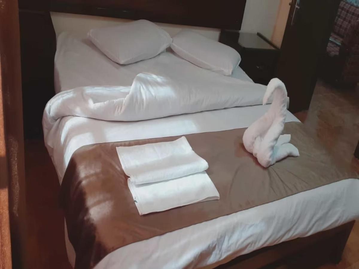 Al-Nujoom Hotel Suites アンマン エクステリア 写真